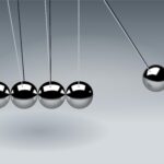 newton-s-cradle-balls-sphere-action-60582-60582 Dynamic illustration of Newton's Cradle showing motion and reflection concepts in physics.